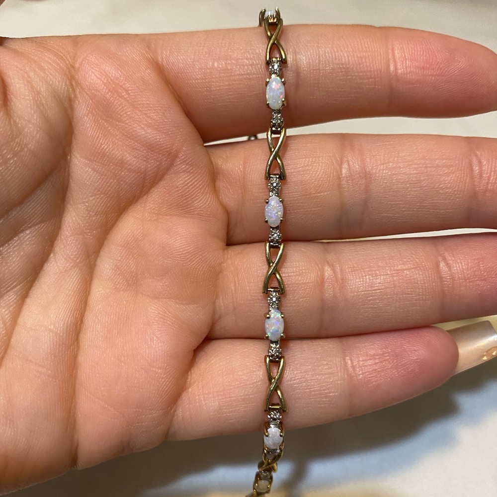 10k bracelet with opal stones and diamond accent